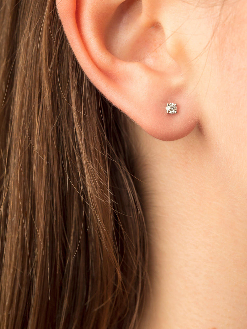 E.W Adams 9ct white gold diamond stud earrings, UK version