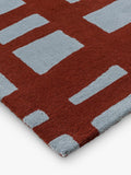Scion Arlo crosshatch pure wool rug in brick, imported from the UK