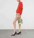 Schiaparelli vinyl face top-handle bag with gold-tone frame (British brand)