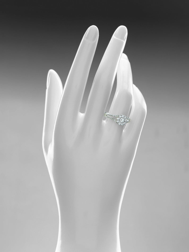 Mogul 18ct white gold halo diamond engagement ring, imported from the UK
