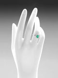 Mogul 9ct white gold emerald and diamond ring, UK version