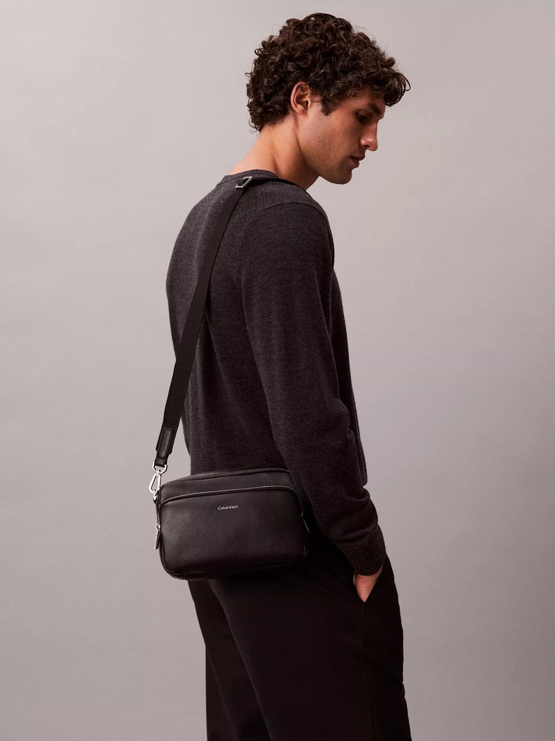 Calvin Klein black camera bag, imported from the UK