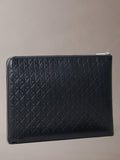 Calvin Klein leather embossed monogram pouch in black, imported from the UK
