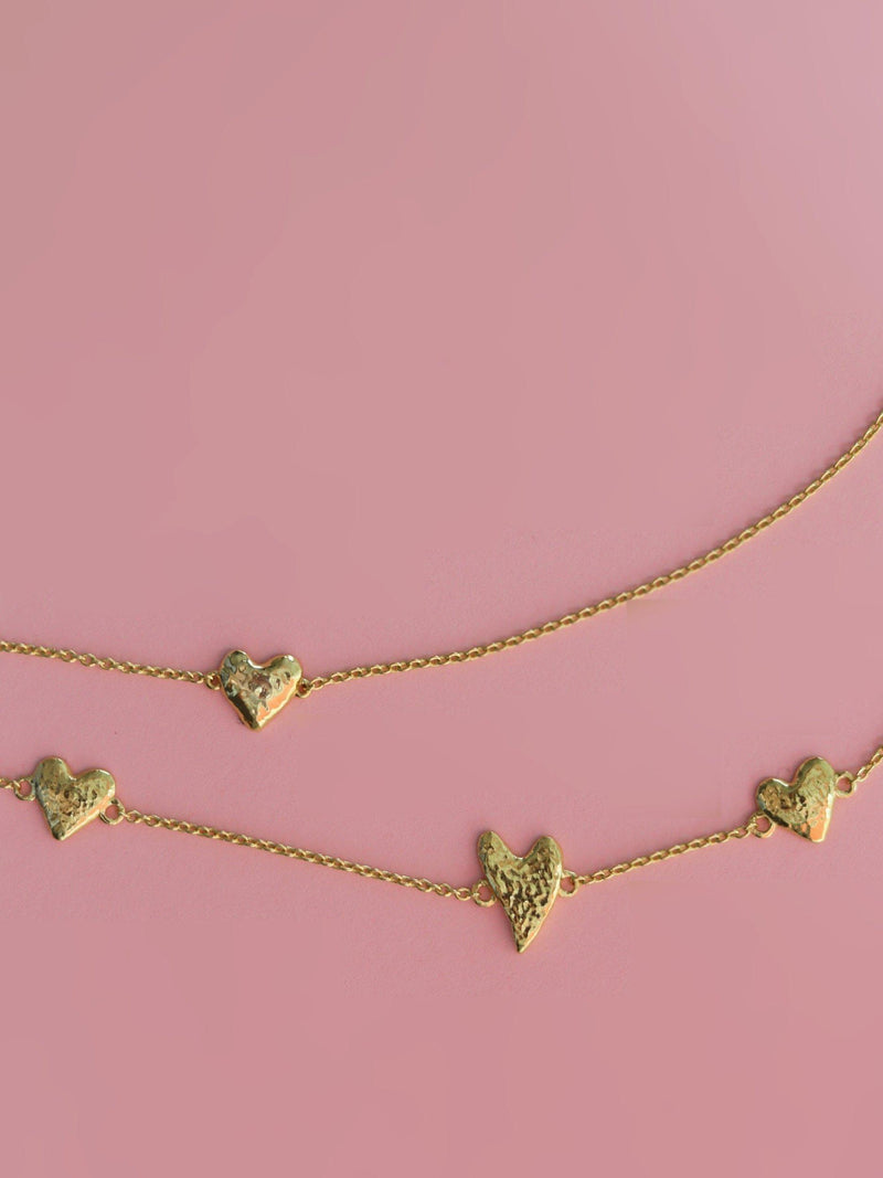 Ottoman Hands triple heart gold bracelet (British brand)