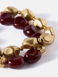 Mint Velvet layered resin bracelet dark red gold, imported from the UK