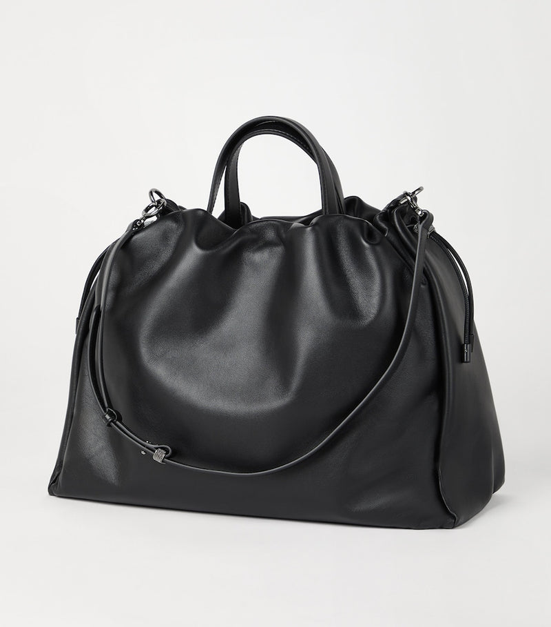 Brunello Cucinelli large leather Mellow bucket bag, imported from the UK