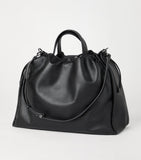 Brunello Cucinelli large leather Mellow bucket bag, imported from the UK