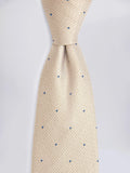 Moss champagne silk tie with blue spots, imported from the UK