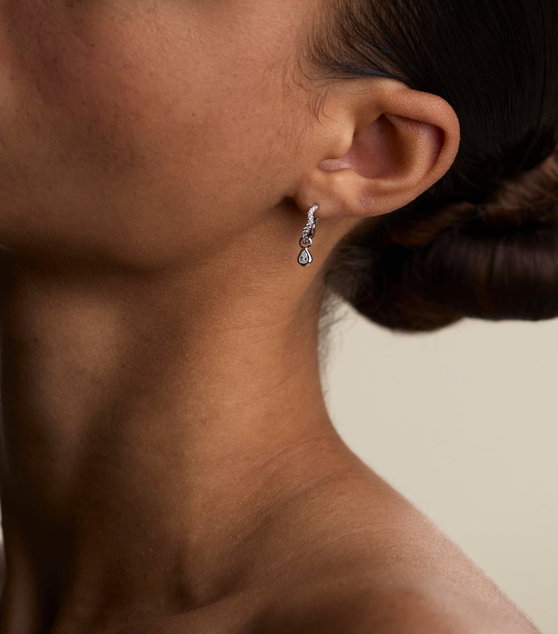 Astrid & Miyu huggie earrings with cubic zirconia, UK version