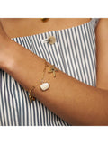Orelia gold charm bracelet with shell and starfish, 16cm (British brand)