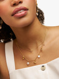 Orelia gold charm necklace with shell and starfish charms - British product
