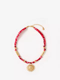 Mint Velvet sun charm necklace in red (British brand)