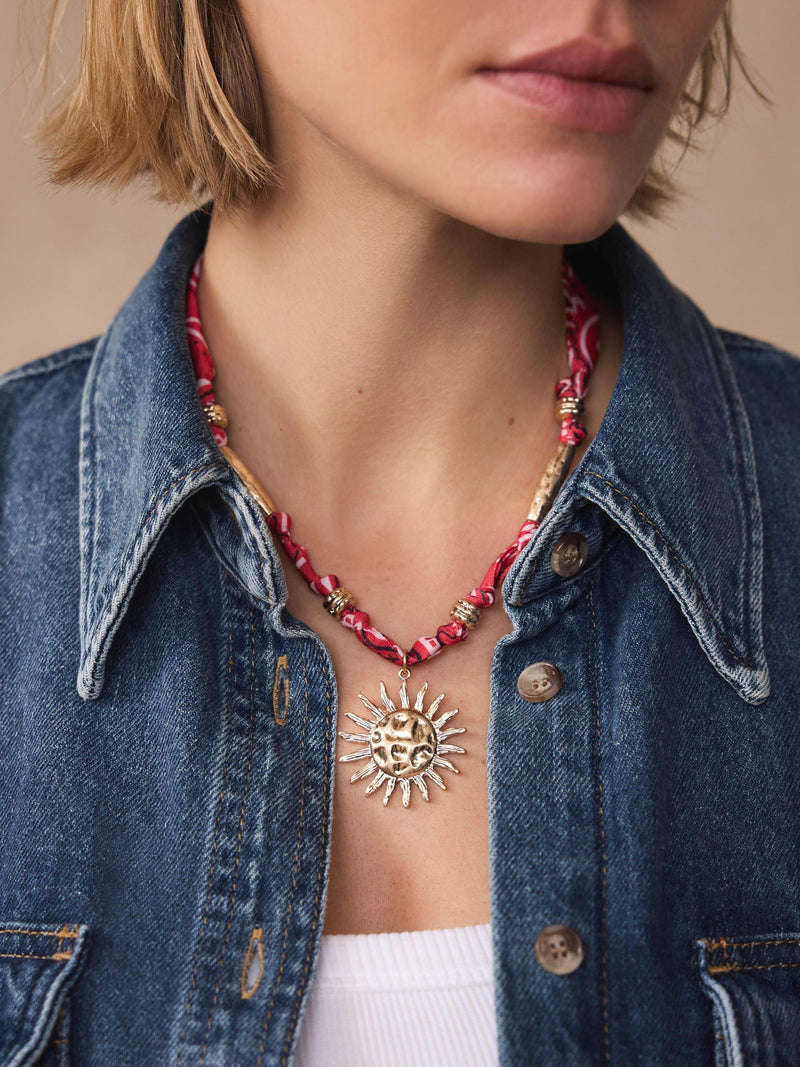 Mint Velvet sun charm necklace in red (British brand)