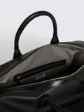 Moss grained leather holdall in black, British brand