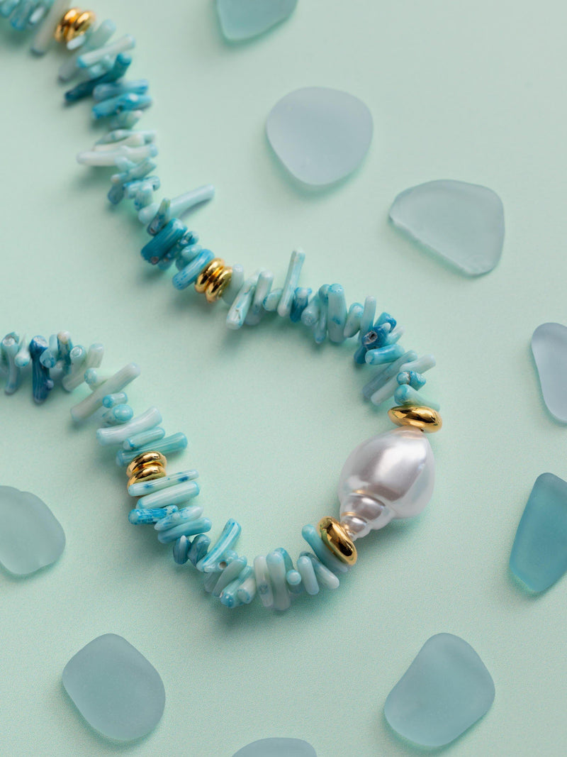 Orelia statement necklace with blue coral chips and pearls, gold plated, UK version