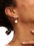 Orelia drop huggie hoop earrings in pearl and silver, UK version