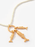 Mint Velvet fish charm necklace gold 47cm, imported from the UK