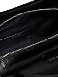 Calvin Klein Emblem shoulder bag in black, UK version