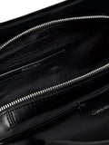 Calvin Klein Emblem shoulder bag in black, UK version