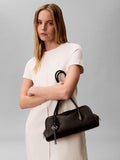 Calvin Klein Emblem shoulder bag in black, UK version