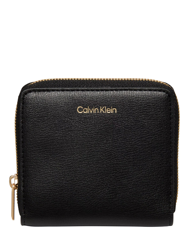 Calvin Klein black zip around wallet in saffiano faux leather, imported from the UK