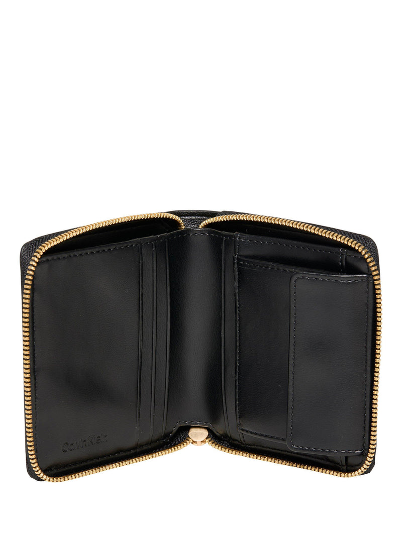 Calvin Klein black zip around wallet in saffiano faux leather, imported from the UK