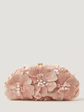 Monsoon Flora embroidered clutch bag in pink, imported from the UK