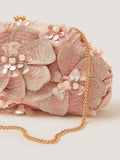 Monsoon Flora embroidered clutch bag in pink, imported from the UK
