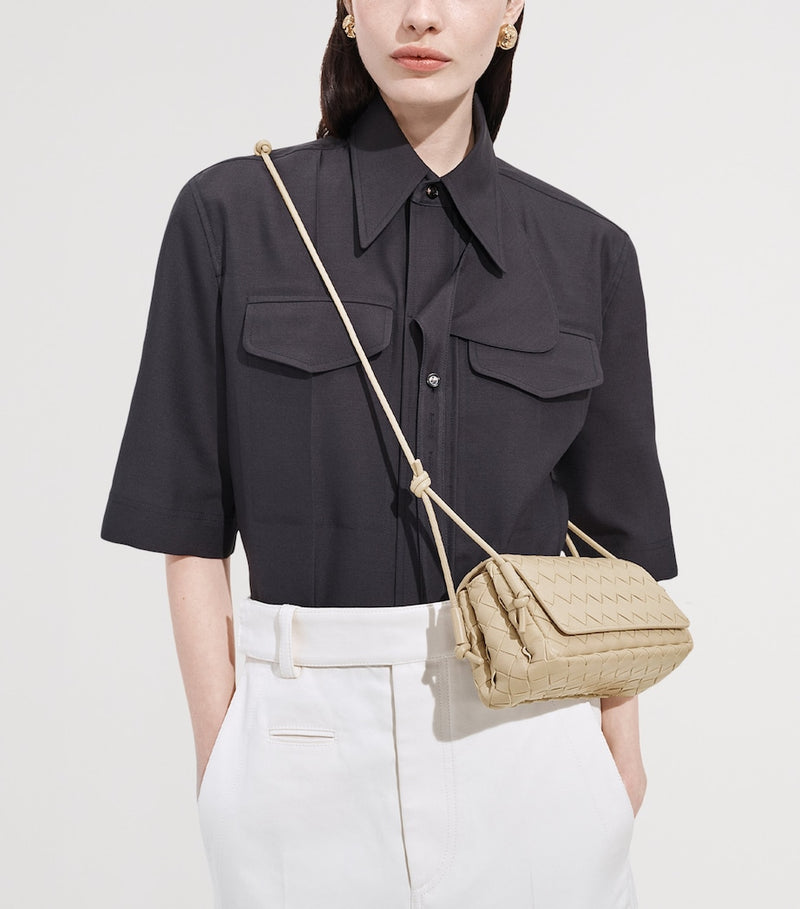 Bottega Veneta Notturno leather pouch, imported from the UK