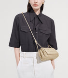 Bottega Veneta Notturno leather pouch, imported from the UK