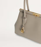 Dolce&Gabbana leather top-handle bag with gold-tone hardware, imported from the UK