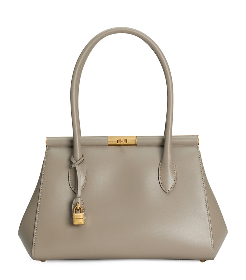 Dolce&Gabbana leather top-handle bag with gold-tone hardware, imported from the UK