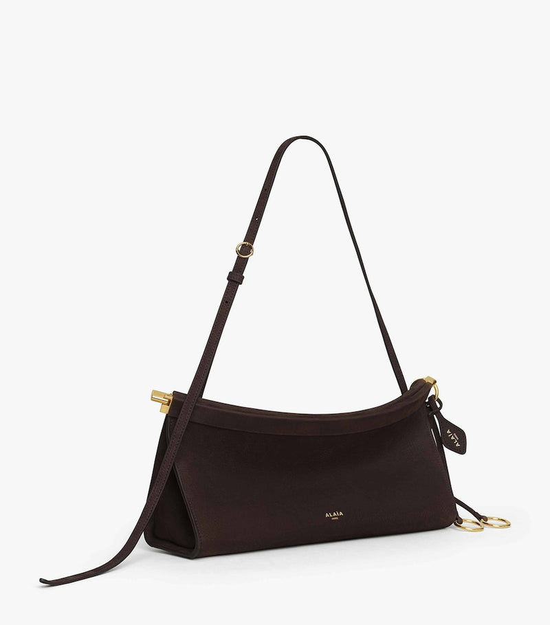 Alaïa Le Click East West shoulder bag, imported from the UK