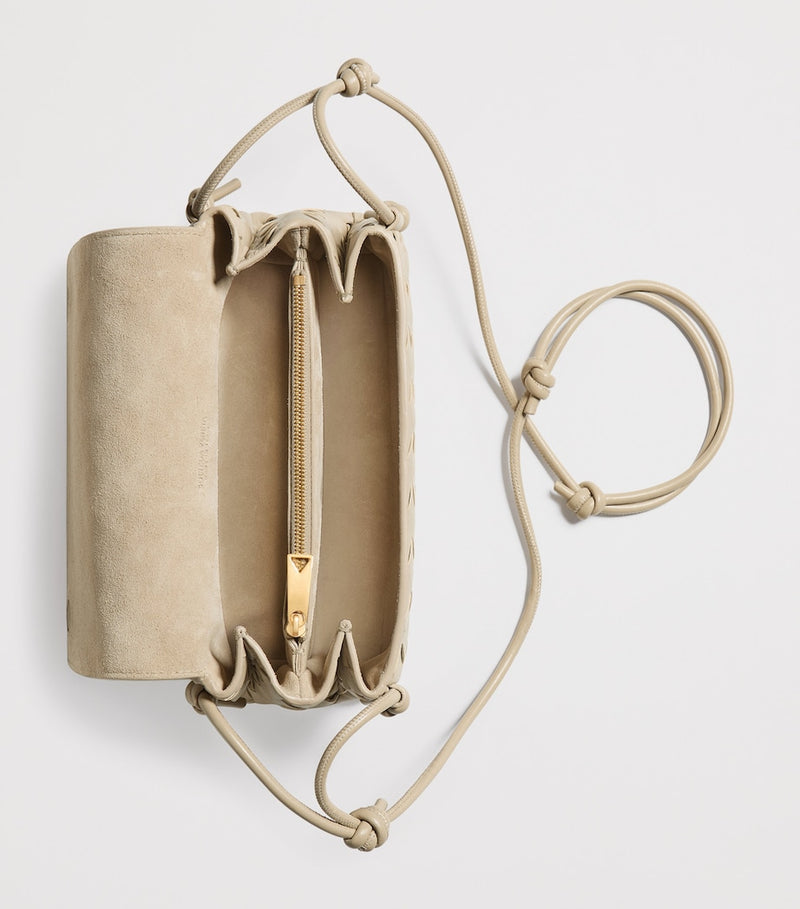 Bottega Veneta Notturno leather pouch, imported from the UK