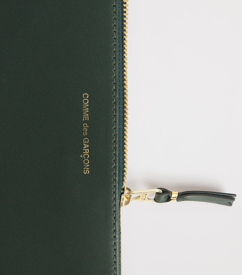 Comme des Garçons large leather pouch, imported from the UK