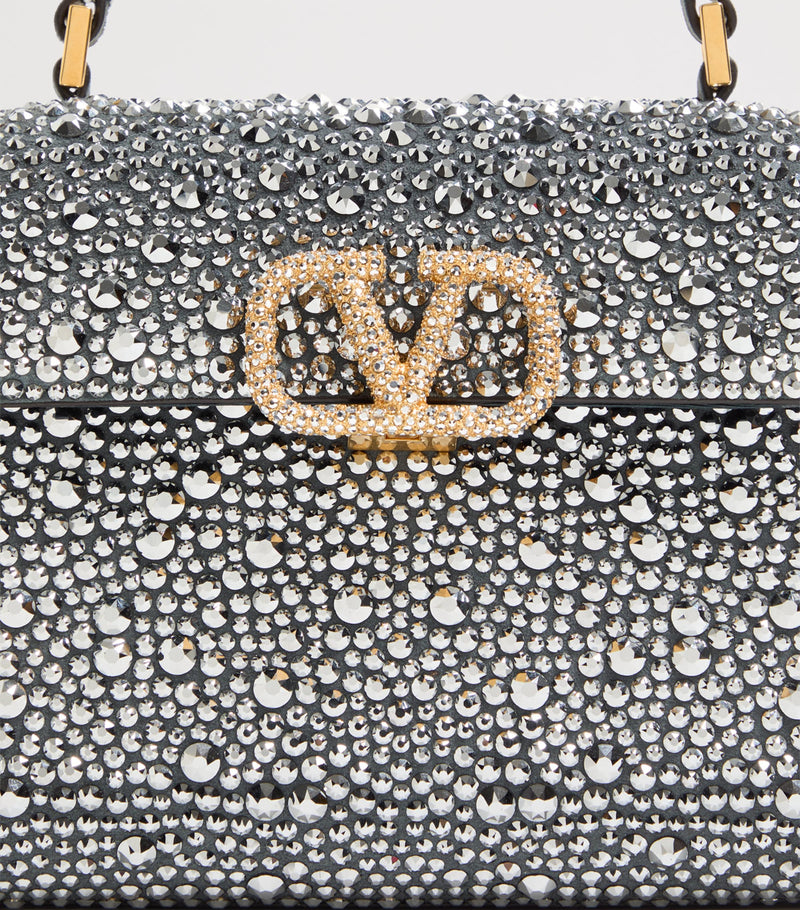 Valentino Garavani mini leather top-handle bag - British product