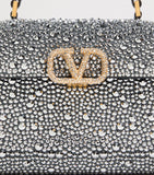 Valentino Garavani mini leather top-handle bag - British product