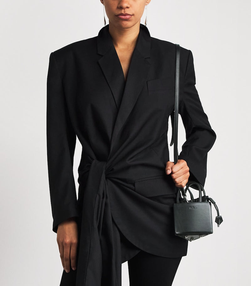 Talel leather triangle top-handle bag - British product