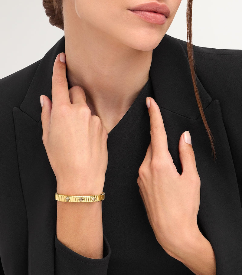 Bvlgari yellow gold Tubogas bangle with diamonds (British brand)