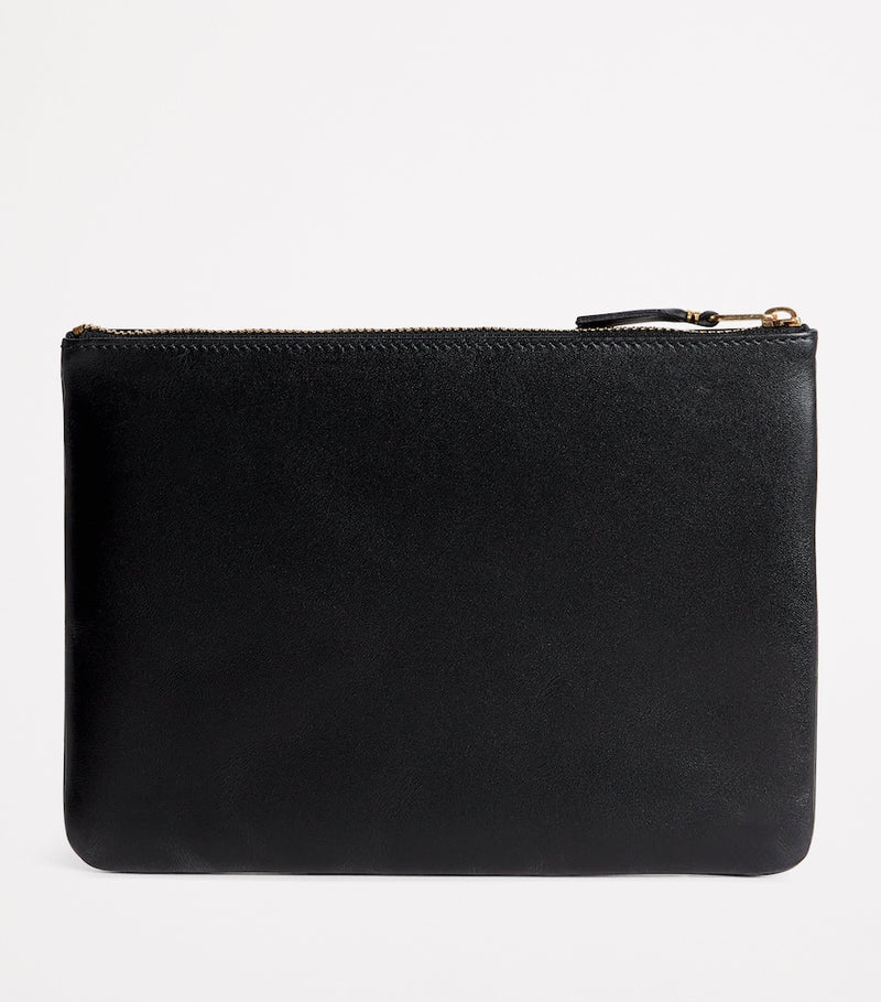 Comme des Garçons large leather zipped pouch - British product