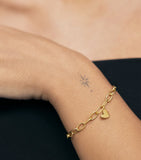 Monica Vinader gold vermeil heart charm bracelet, UK version