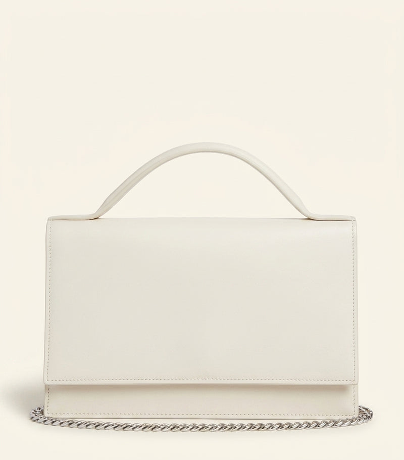 McQueen leather skull top-handle bag, imported from the UK