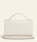 McQueen leather skull top-handle bag, imported from the UK