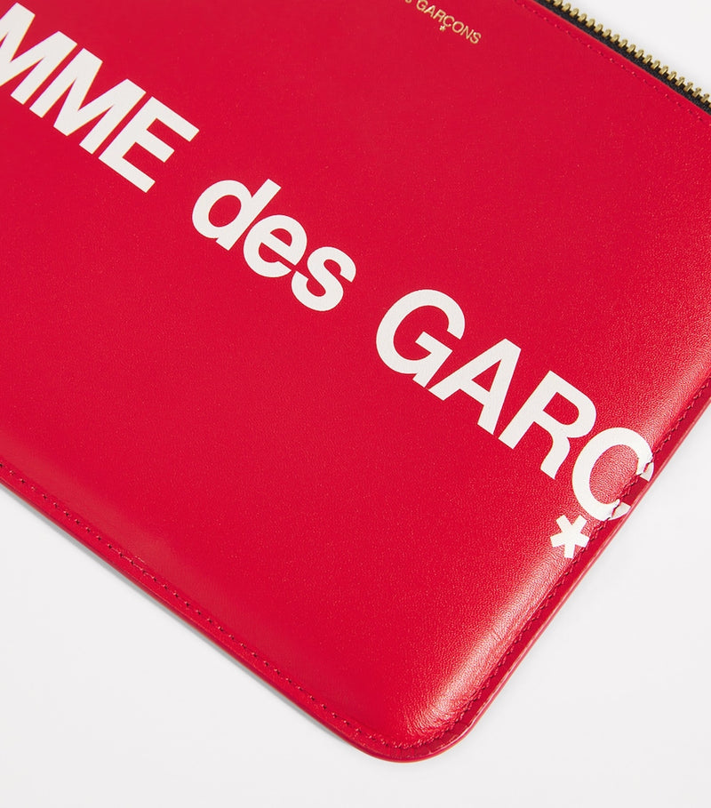 Comme des Garçons large leather logo pouch, UK version