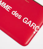 Comme des Garçons large leather logo pouch, UK version