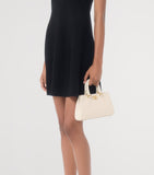 Valentino Garavani VLogo Mini top-handle bag in grained leather (British brand)