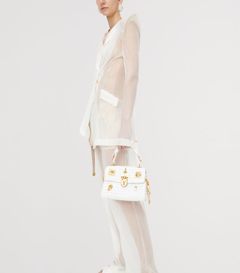 Schiaparelli mini calfskin bijoux secret top-handle bag, imported from the UK