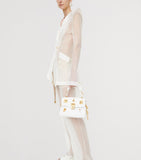 Schiaparelli mini calfskin bijoux secret top-handle bag, imported from the UK