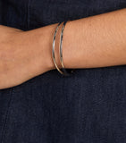 Astrid & Miyu silver-tone crossover illusion twist bangle 6.5cm, imported from the UK