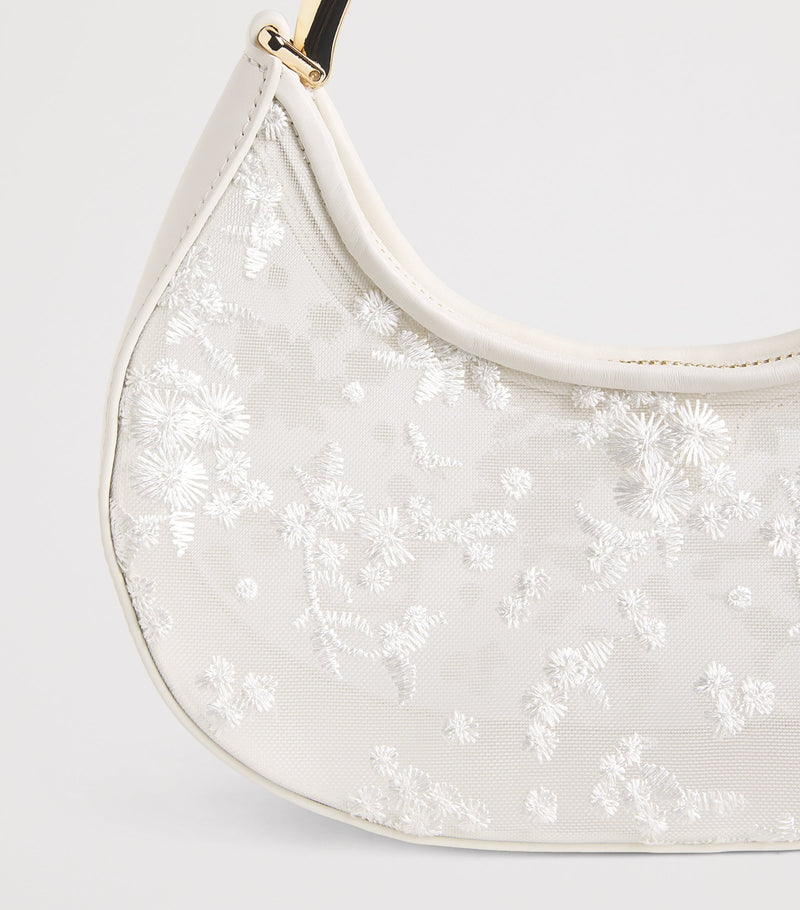 Simkhai Nixi embroidered mesh clutch bag, imported from the UK